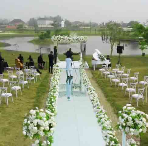 Try a glass aisle as a wedding decor for a Nigerian wedding