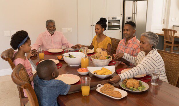 Tips for raising Godly children - Family praying together before meal.
